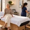 Woman relaxing in a bright Midtown Manhattan wellness room in autumn, representing a colon cleanse in NYC and lymphatic drainage for fall immune support